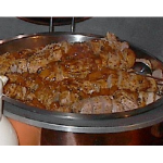 Schweinefiletmedaillons im Reisbett mit Ananas-Pfeffer-Soße